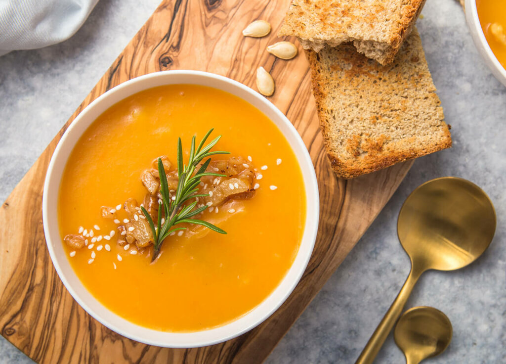 soup and bread on board